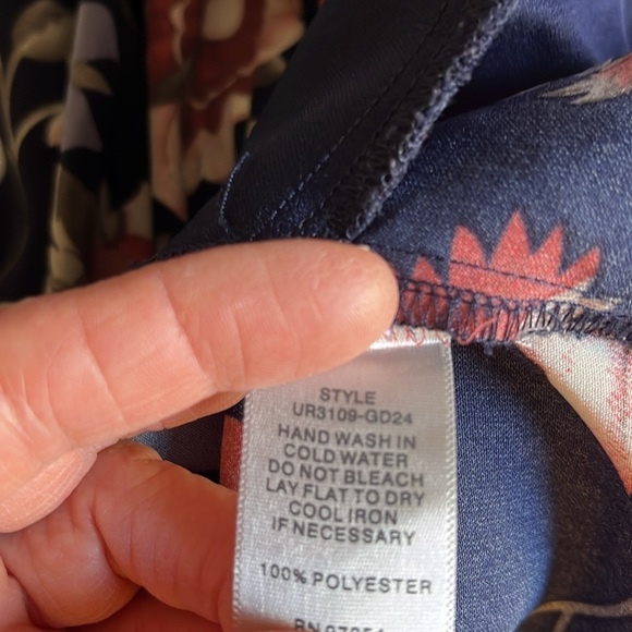 One❤️Clothing navy blue floral long sleeved romper. Size XS. Open V in the back. - Picture 13 of 14